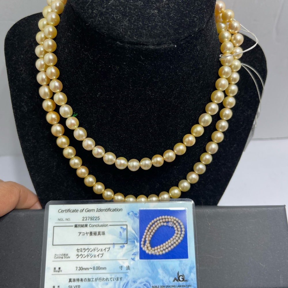 Akoya Pearl size 7.3 mm to 8 mm , i33 inches in length , color yellowish/cream
